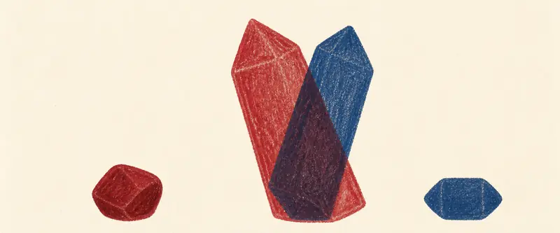 Birthstone compatibility: a red garnet and a blue sapphire leaning together, the colour deepening where the two overlap