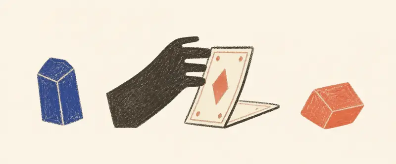 Yes or no tarot draw: a hand turning a single card mid-turn, one raw crystal standing to each side